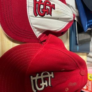 Two hats one youth and one adult. Stlouis cardinals